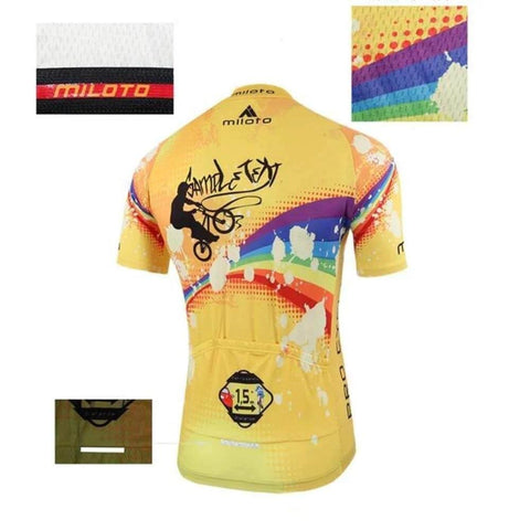 Rear view of a colorful cycling jersey with abstract graphics, showing details of fabric texture and stitched logos.