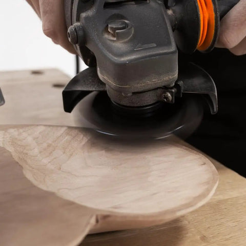 Knockout Turbo Scraper Wheel For Angle Grinders With Swivel Carbide Blades smoothing wood surface with rotating carbide blade.