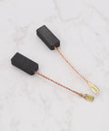 Two Pairs Carbon Brush Motor Brush Spare Part For Power Tools 6.5 x 8 x 18 mm With 45 mm Cable on light background
