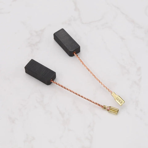 Two Pairs Carbon Brush Motor Brush Spare Part For Power Tools 6.5 x 8 x 18 mm With 45 mm Cable on light background