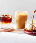 Three glasses with iced coffee and cold brew, demonstrating use of No Mess Cold Brew Filters 100 Count Disposable Fine Mesh Bags.