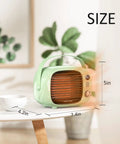 Fast Heating Desk Space Heater With Adjustable Thermostat, 800W/500W Ceramic Heating Fan, green, on table, compact size.