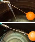 3/4 inch float ball valve installed in water tank with orange float for adjusting water levels in DIY projects, pools, and stock tanks.