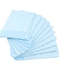Hella Soft Disposable Bed Pads For Adults Heavy Absorbent Underpad With Odor Blocking Fluff Pulp Super Gentle On Skin Top Pick For Maternity Recovery Baby Changing And Sweet Dreams 10 Pack Large stacked in a fan arrangement.