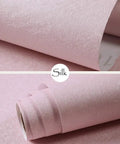Close-up of pink silk peel and stick wallpaper rolls, textured silk look, waterproof self adhesive, 15.7 inch wide, 197 inch long.