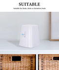 Compact Desktop Water Dispenser For Desk And Dorm Room Portable Countertop Drinking Machine with baskets underneath.