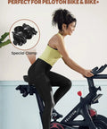 Woman on Peloton with Extra Wide Comfort Bike Seat For Men And Women Pain Free Rides With Ergonomic Design and Ventilation Holes