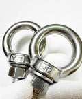 Two Pack M12 304 Stainless Steel Shoulder Eyebolts With Nuts And Flat Washers Heavy Duty Lifting Eyebolts shown in hand