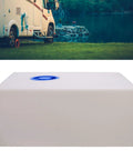 33 Gallon Food Grade LLDPE RV Water Holding Tank for Camping and Trailers, shown near a lake, ideal for outdoor adventures.