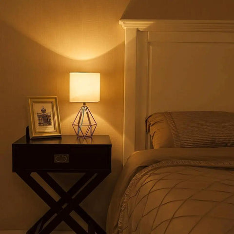 Gold Table Lamps Set Of 2 Dope End Table Lamps With White Fabric Shades on nightstand in cozy bedroom, geometric metal base.