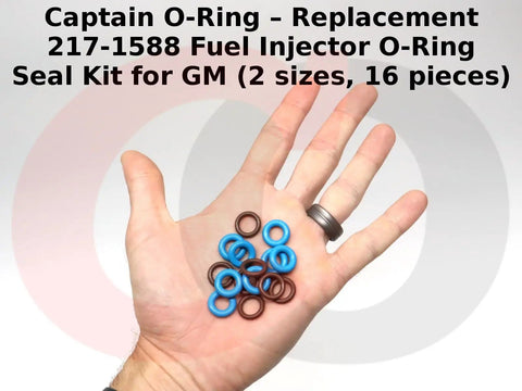 Hand holding Fuel Injector O Ring Seal Kit 217-1588 Replacement For GM Vehicles, 16 pieces, two sizes, blue and brown O-rings.