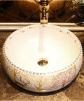 USZWBY Vessel Sinks Bathroom Vessel Sink Nordic Round Ceramic Washbasin Forest Art Countertop Basin with faucet, top view.