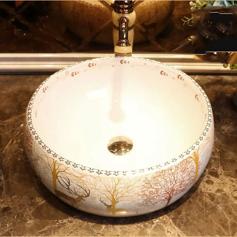USZWBY Vessel Sinks Bathroom Vessel Sink Nordic Round Ceramic Washbasin Forest Art Countertop Basin with faucet, top view.
