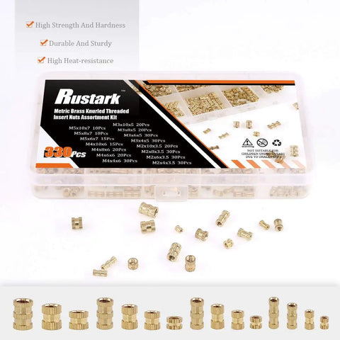 All In One 330 Piece Knurled Threaded Insert Kit Brass Embedment Nuts Set M2 M3 M4 M5 Female Threads For Wood Plastic Metal Versatile Assortment With Durable Clear Box Storage, showing nuts spread out in front of the packaging.