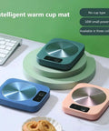 Rapid Heat Electric Cup Warmer Locks Your Favorite Brew Piping Hot Through The Entire Grind Temp Control Pad in blue and pink.