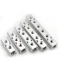 Front angled view of six aluminum alloy 2-way pneumatic manifold blocks with multiple threaded ports (G1/2 supply, G1/4 outputs).