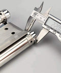 Pair Of Eight Inch Heavy Duty Stainless Steel Cafe Saloon Door Self Closing Double Action Spring Hinges being measured
