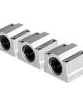 Beefed-Up Linear Motion Bearing Slides for CNC Parts and 3D Printers, SCS6UU to SCS20UU and SCS8LUU to SCS13LUU Range, Precision Machinery Rails, Smooth Ball Bearing Carriages for Accurate, Reliable Motion and Easy Upgrades. Three silver linear bearing blocks