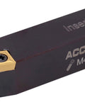 Close-up of gold TiN-coated indexable turning insert in a square holder.