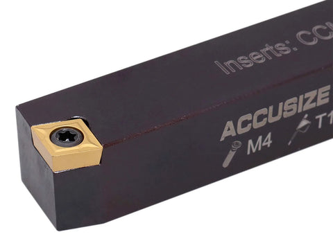 Close-up of gold TiN-coated indexable turning insert in a square holder.