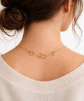 Woman wearing necklace with Set Of 4 S Hook Necklace Extenders With Gold And Silver Swirl Hooks Durable Metal Jewelry Extenders