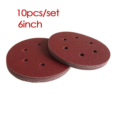 Premium 6 Inch Hook And Loop Sandpaper Discs Set, two anti-clogging aluminum oxide sanding discs, each with holes for dust removal.