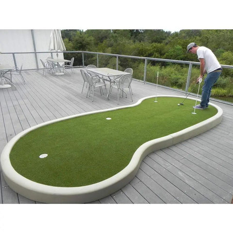 Man practicing on Pro Grade Indoor Outdoor Golf Putting Green Mat With Dense Artificial Grass Turf 5 Ft By 10 Ft For Home Practice Baseball Football Gym Sports Soft Feel High Density Synthetic Lawn
