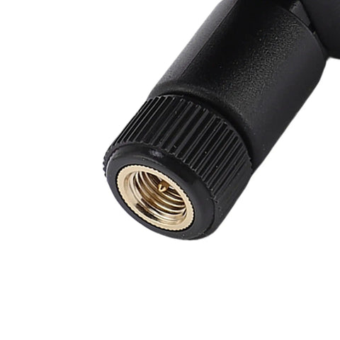 Close-up of SMA connector on High Gain Ceramic Mushroom Antenna With SMA Connector Foldable Antenna For Vehicles Boats Drones And Marine Outdoor Navigation Amped Up Signal Booster For Stronger Reception And Anti Interference.