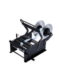 Handheld Self Adhesive Bottle Labeler Compact Manual Applicator Tool For Cans Jars With Handle in black with reels and labels visible.