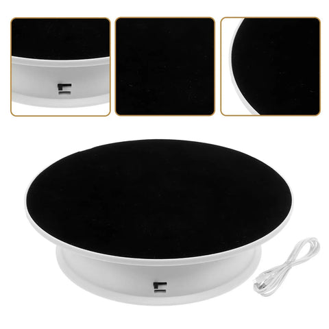 Ultimate 360 Degree Electric Turntable Rotating Display Stand With Two-Speed Adjustment For Jewelry Watches Photoshoot And Commercial Showcase Using White Base And Black Velvet Surface, showing a black velvet top and white base.