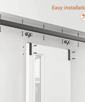 60 Inch Box Rail Sliding Barn Door Hardware Kit With Ceiling Mount Heavy Duty Aluminum Track In Black Powder Coat Outdoor Ready And Anti Corrosion Fits Doors Up To 26 Inch Opening Up To 30 Inch Panel Width 1 Inch Door Thickness, shown installed on a white wall with a door.