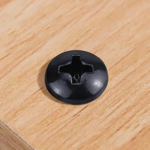 Pro Grade Phillips Pan Head Self Tapping Screws, Black Coated 304 Stainless Steel Tek Fasteners on wood surface.
