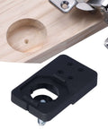 Black ABS 35mm hinge boring jig for door hinge installation on wood, with metal clamp