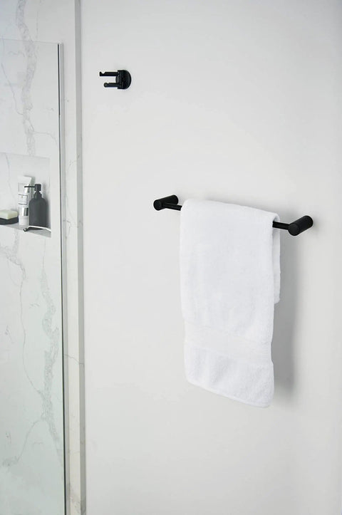 Dope Matte Black Double Swivel Robe Hook From Align Collection Modern Bathroom Accessory installed on wall with white towel