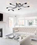 Eight Light Sputnik Ceiling Fixture In Matte Black Cool Industrial Chandelier Semi Flush Mount installed in living room