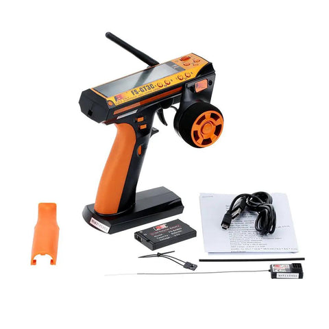 Flysky FS-GT3C RC Transmitter 2.4GHz 3CH LCD Remote Controller with FS-GR3E receiver, orange grip, and accessories.