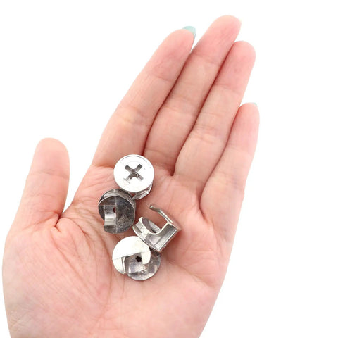 Heavy Duty Zinc Alloy Furniture Cam Locks 50 Pack Cam Bolt Nut Connectors 15 X 12 Mm Silver in hand for cabinet assembly.