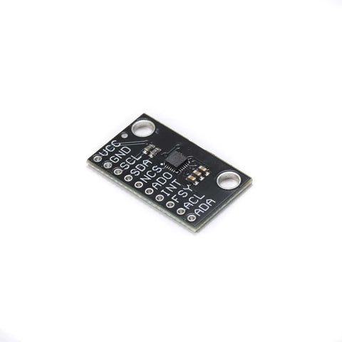 Low Power 9 Axis Motion Sensor Module With I2C Interface Gyroscope Accelerometer And Magnetometer on white background.
