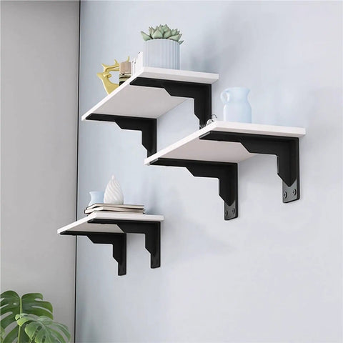 Badass Black Industrial Floating Shelf Brackets Two Pack Dead Reliable Thick Steel L Corner Wall Mounts Built Tough Garage Kitchen Storage Hardware No Sweat Install - Installed shelves displaying decor.