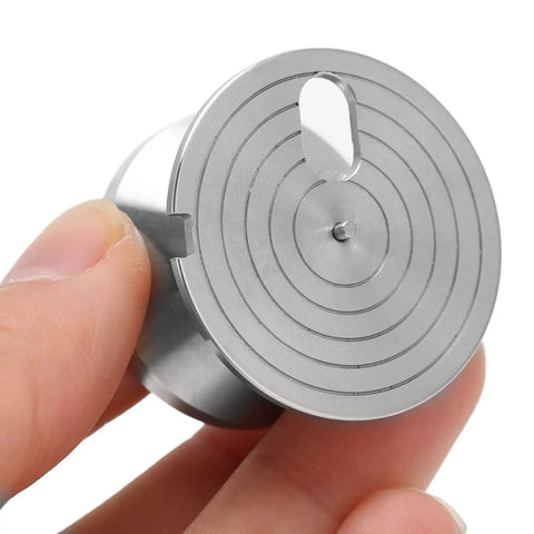 Stainless Steel Watch Movement Holder Base for Precision Modding and Repair, Needle Mounting Stand held between fingers, top view