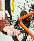 Person using 8 Pack 12 Speed Bike Chain Quick Link Set For Mountain And Road Bikes Reusable Steel Missing Link and Chain Hook
