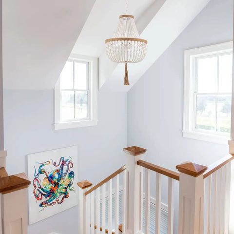 Four Light Wood Beaded Boho Farmhouse Pendant Chandelier With Tassels In White Rustic Bohemia Style in bright stairwell