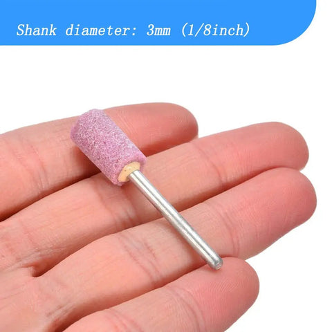 Close-up of a cylinder-shaped bit from the 20 Piece Rotary Grinding Stone Bits Set with One Eighth Inch Shank in a hand
