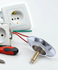 Rotary Bathtub Drain Stopper Copper One Press Seal Hair Catcher with tools and electrical sockets in the background.