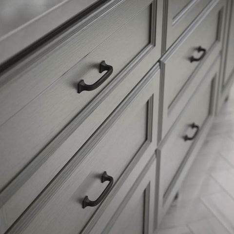 Lombard 3 Inch Center To Center Matte Black Cabinet Handles on gray dresser drawers for modern hardware update.