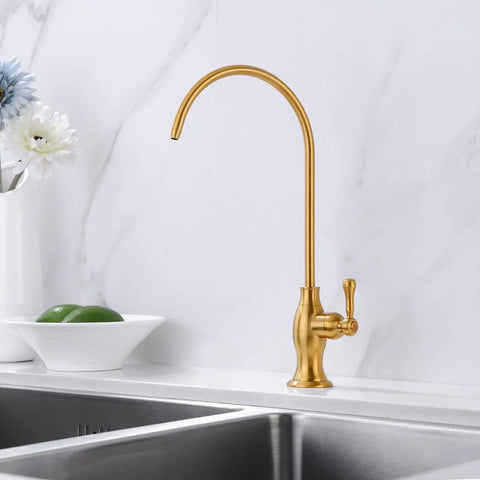 Brushed Gold Drinking Water Faucet For Under Sink RO System on marble counter near sink, deep gold finish