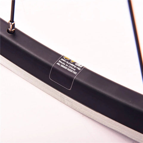 Close-up of 700C road bike aluminum rim from the 700C Road Bike Wheelset With Aluminum Rim And Carbon Hub, V Brake Quick Release.