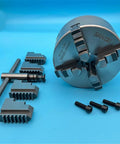 Rock Solid 130Mm Four Jaw Self Centering Lathe Chuck K12-130 with accessories, heavy duty steel for precision machining.