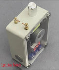 Handheld device with ignition switch and digital display showcasing electronics components.
