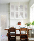 Kitchen with Self-Adhesive Privacy Glass Window Film Milky Tint 17 Inch By 78 Inch Roll 3-Pack With Applicator on cabinets and door.